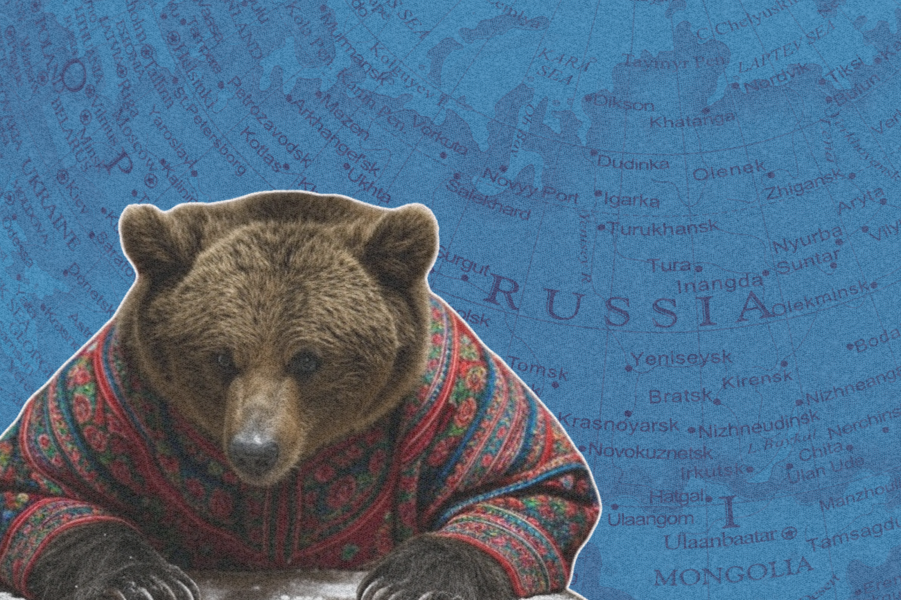 Niedźwiedź na tle mapy Rosji.
