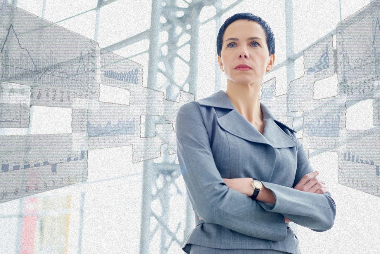 Bizneswoman na tle wykresów.