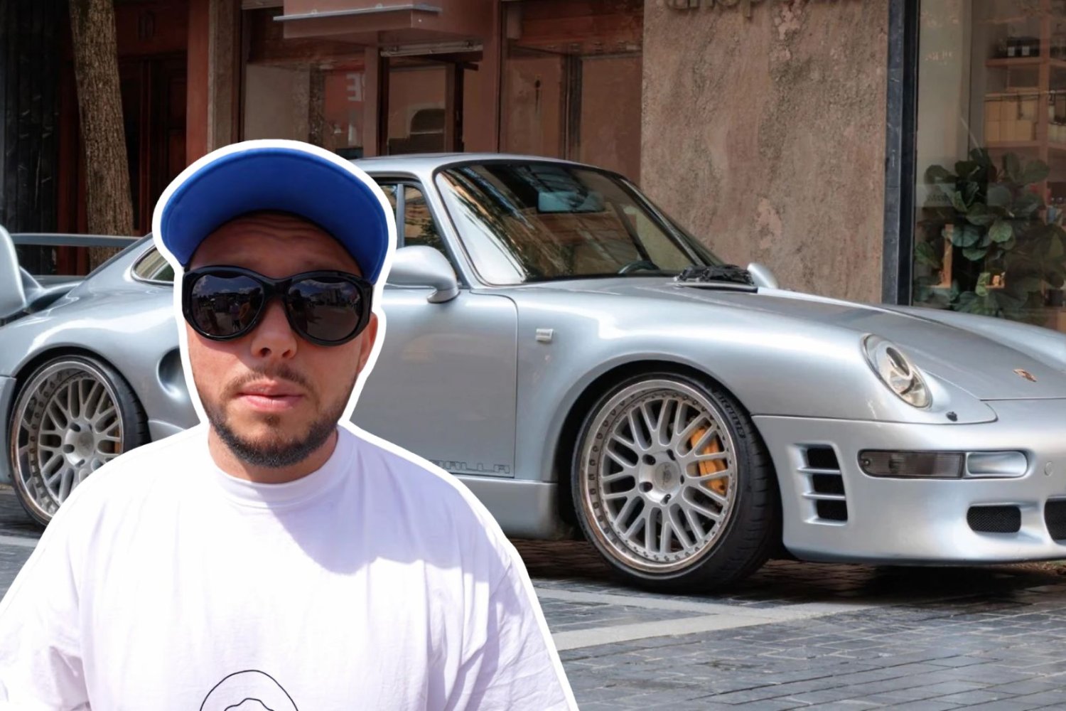 książulo na tle samochodu marki Porsche.