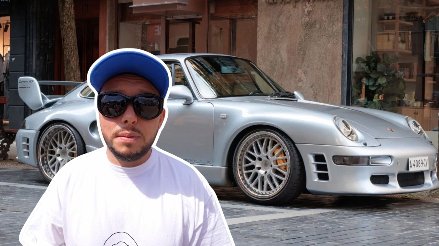 książulo na tle samochodu marki Porsche.