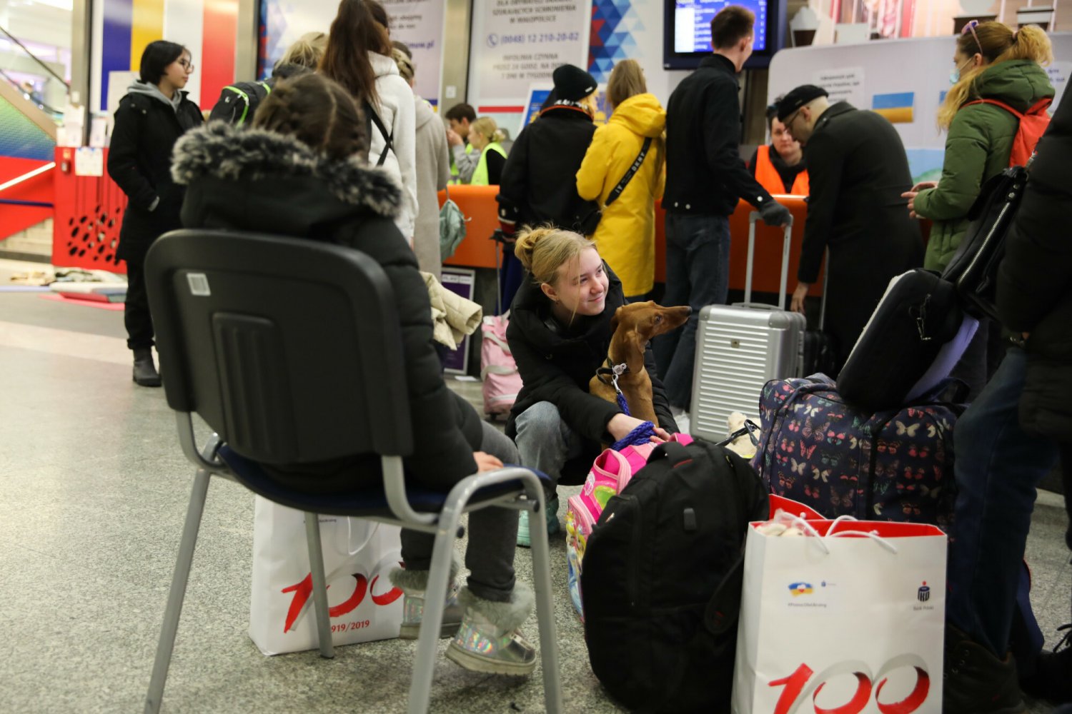 Migranci, a dzietność w państwach OECD