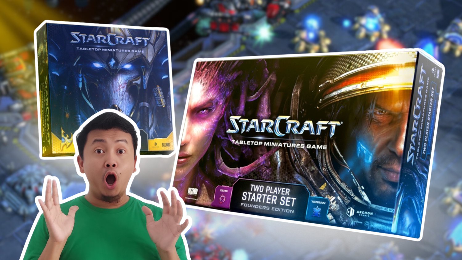 Planszówka StarCraft. W tle gra komputerowa StarCraft. Zaskoczony mezczyzna.