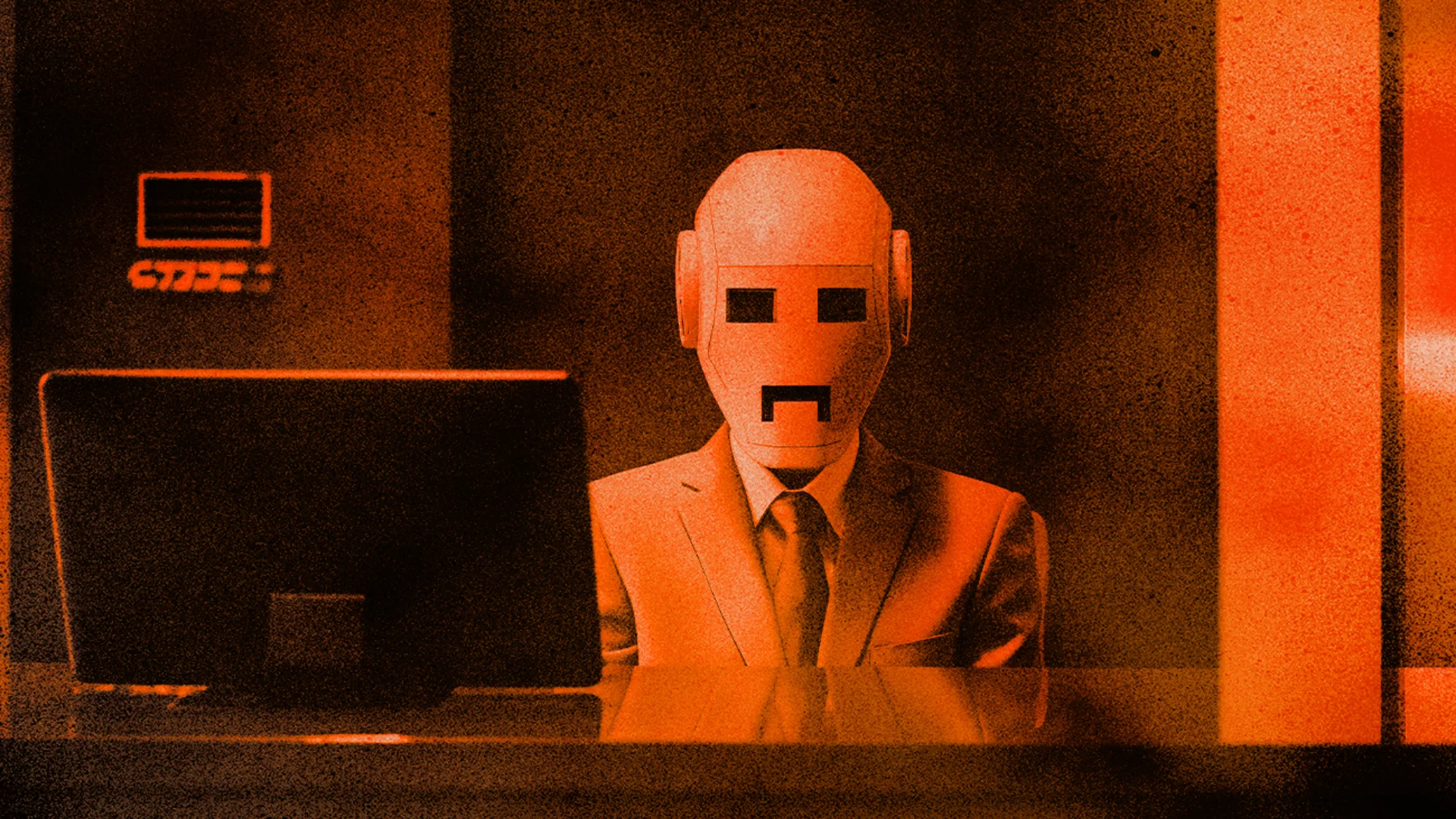 Robot siedzi za biurkiem. Oto jak mówić o AI na rozmowie rekrutacyjnej