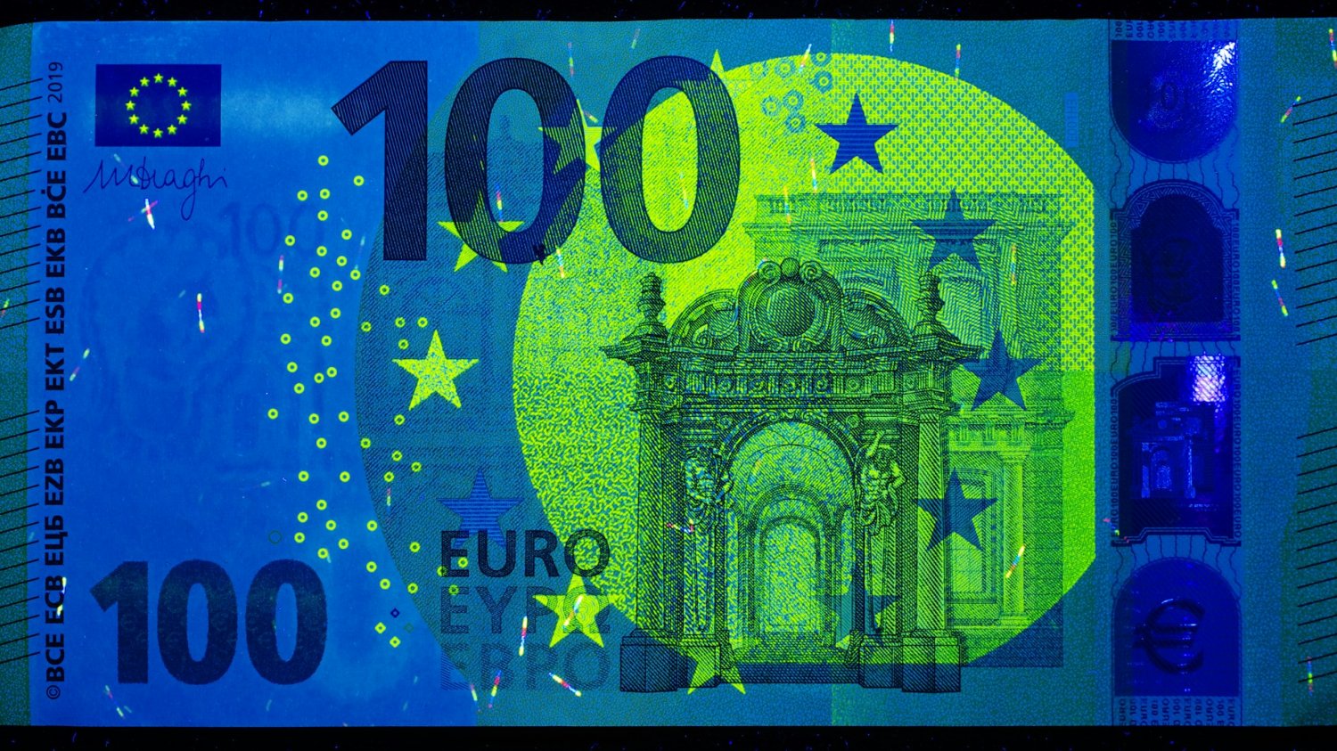 Banknot 100 euro w świetle UV. Niemcy: eksperci apelują o reformy mimo sztucznego wzrostu