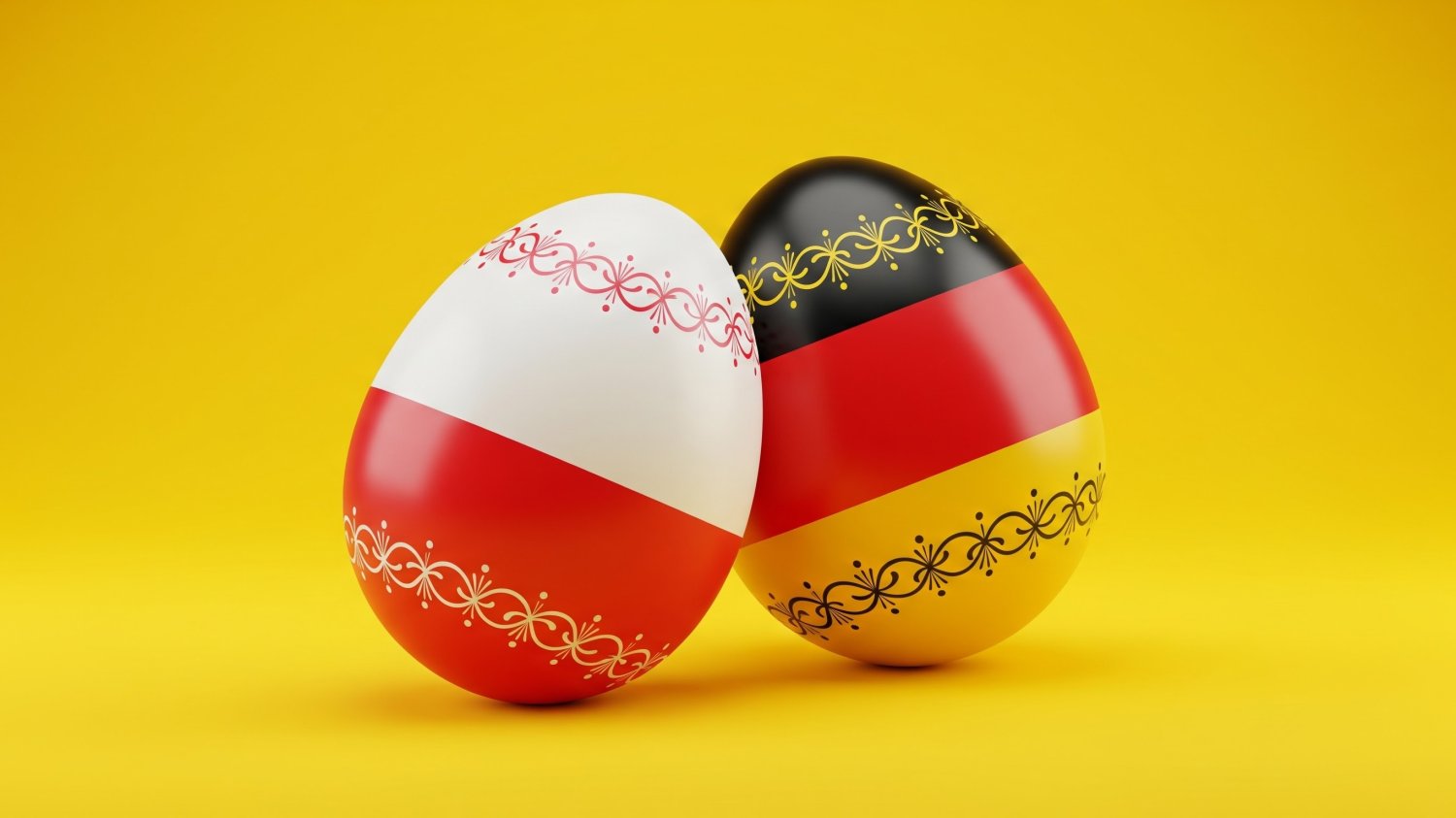 Polskie jaja na niemieckich stołach. Nie tylko na Wielkanoc. Dwa jajka. To po lewej pomalowane na wzór flagi Polski, to po prawej na wzór flagi Niemiec.