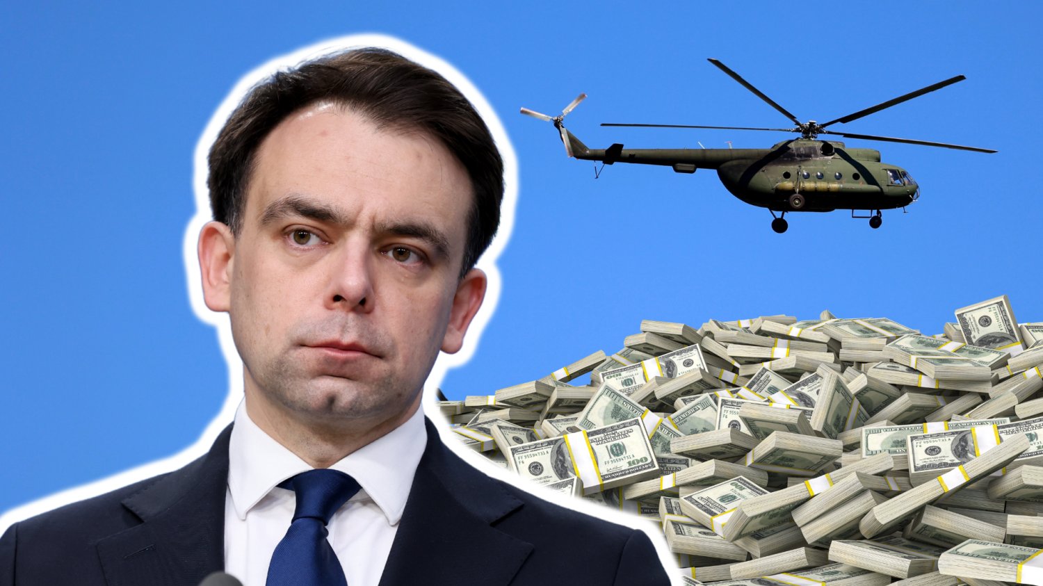 W tle śmigłowce. Andrzej Domański minister finansów. Pieniądze.