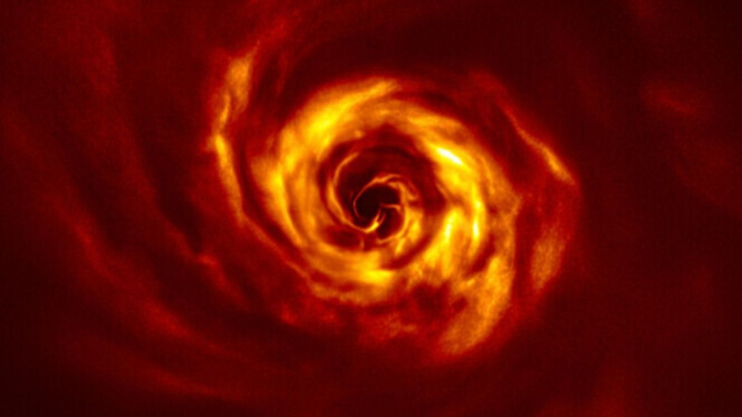 W chmurze gazu i pyłu krążącej wokół gwiazdy AB Aurigae astronomowie z ESO dostrzegli kształt, który prawdopodobnie jest planetą w pierwszych momentach życia.