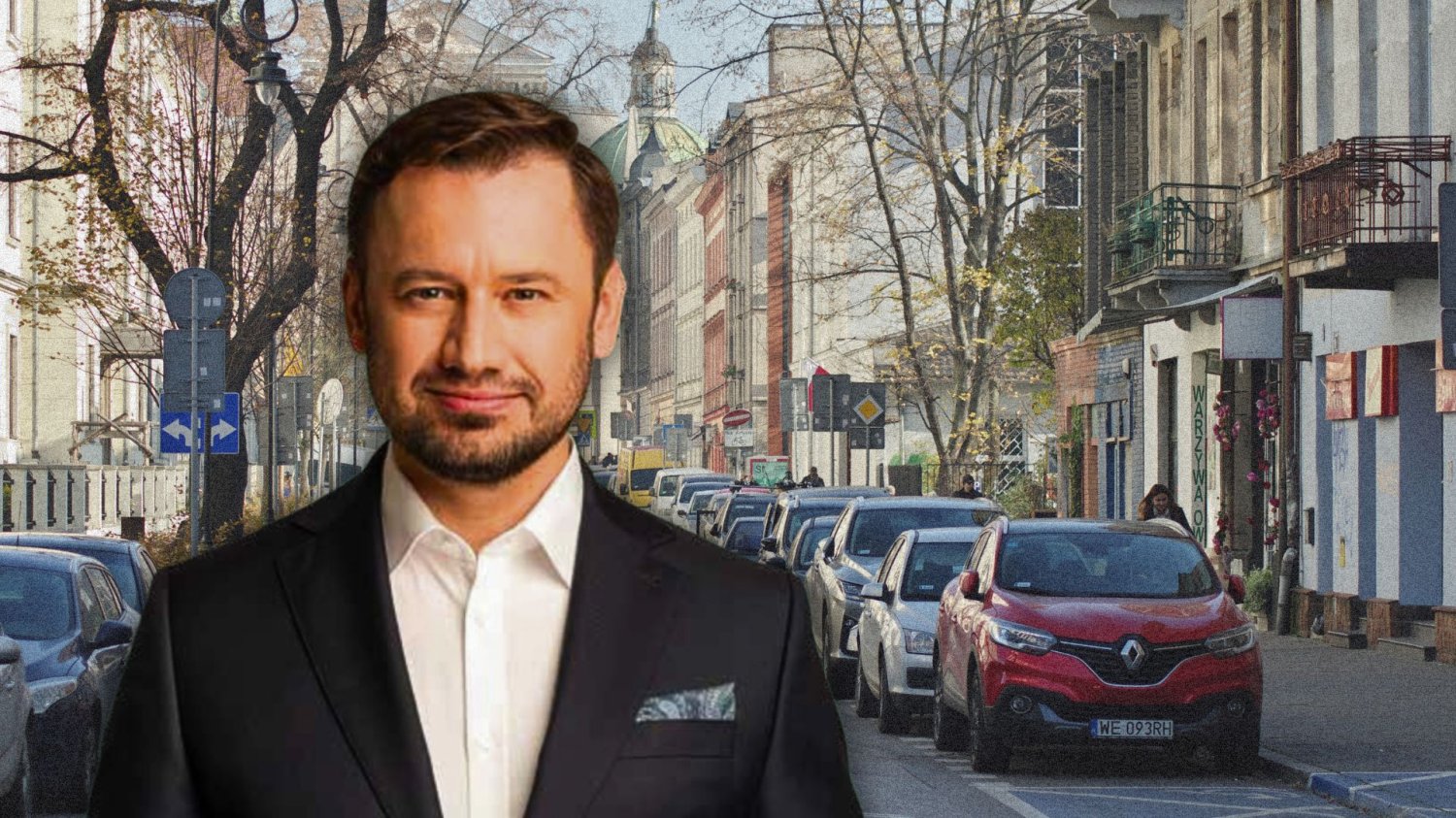 Kraków wycofuje opłaty za parkowanie w niedziele. Widmo referendum wymusiło odwrót. Aleksander Miszalski na tle ulicy Krakowa.