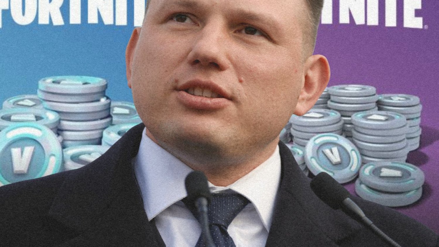 Sławomir Mentzen na tle sklepu z v-dolcami.