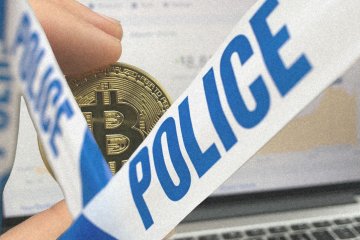 Policyjna taśma i bitcoin.