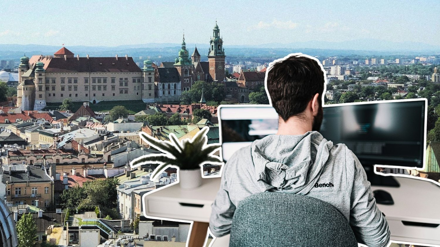 Kraków liderem pracy zdalnej w Europie. Polska bezlitośnie ogrywa Zachód. Mężczyzna siedzi przy biurku z laptopem. W tle panorama Krakowa.