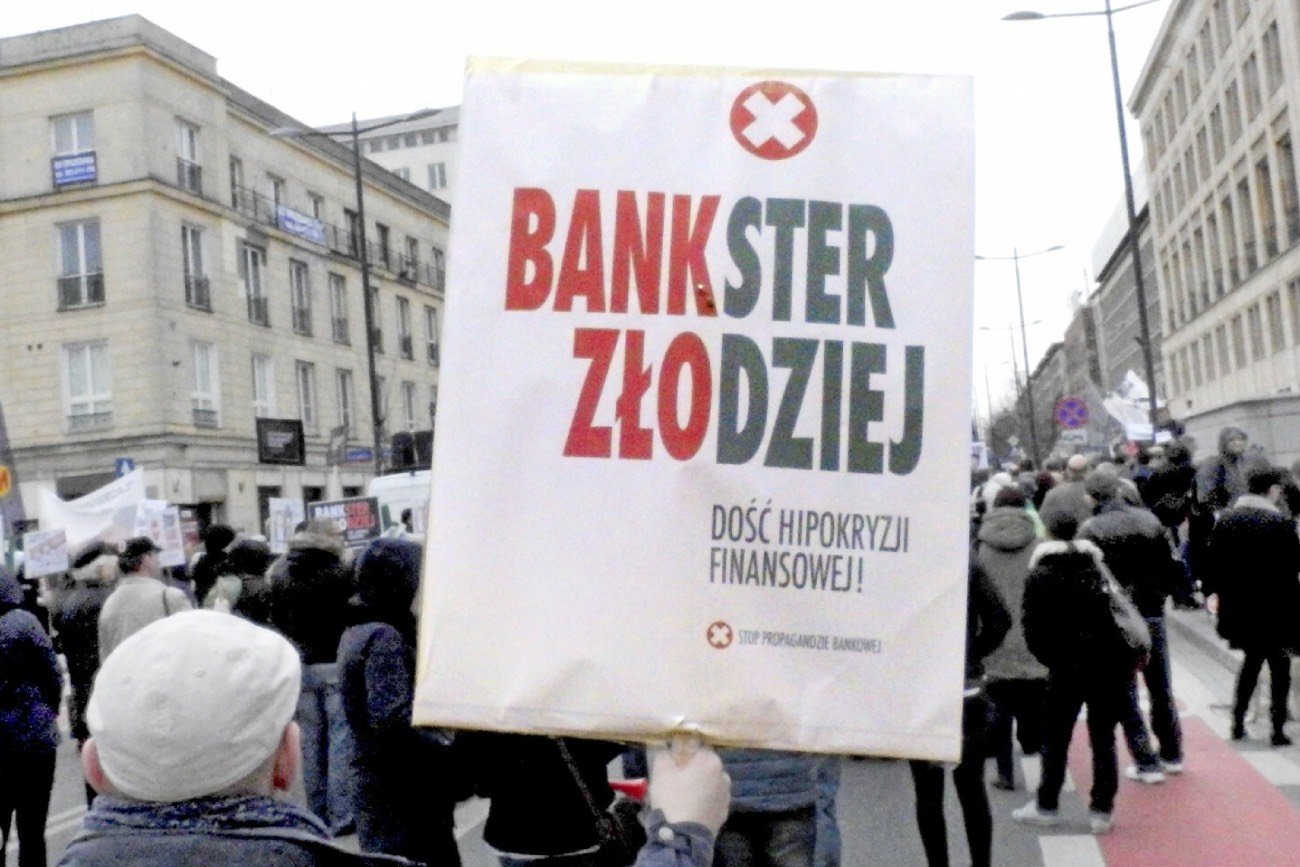 transparent z napisem Bankster Zlodziej