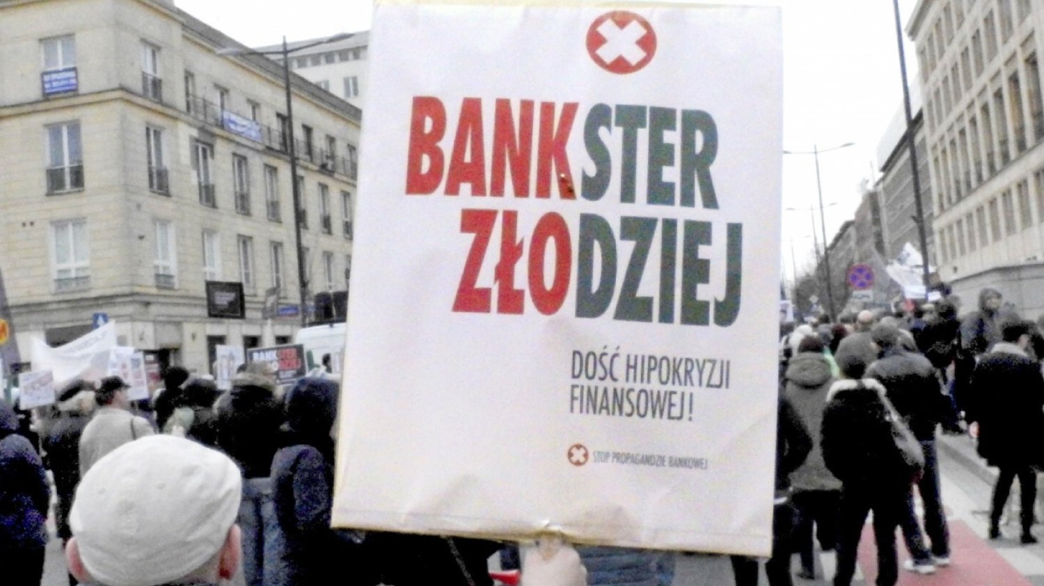 transparent z napisem Bankster Zlodziej