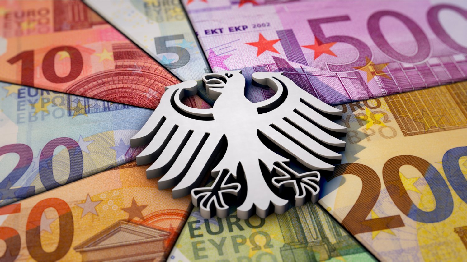 Niemiecki orzeł. Wokół poskładane banknoty euro.