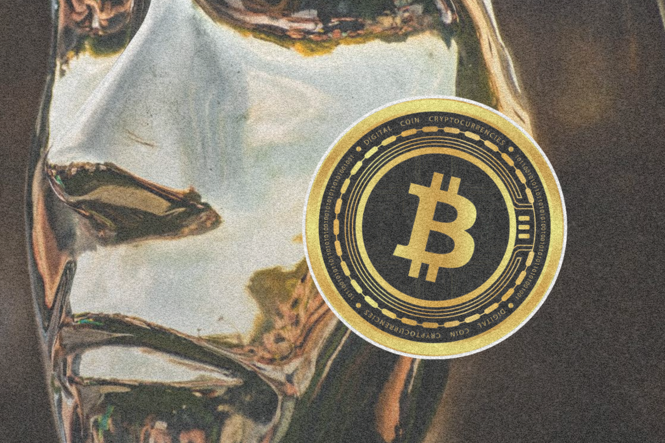 Figura Satoshiego Nakamoto i symbol bitcoin.