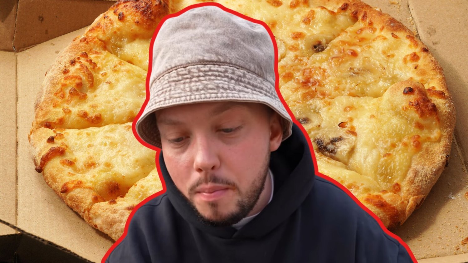 Książulo, w tle pizza
