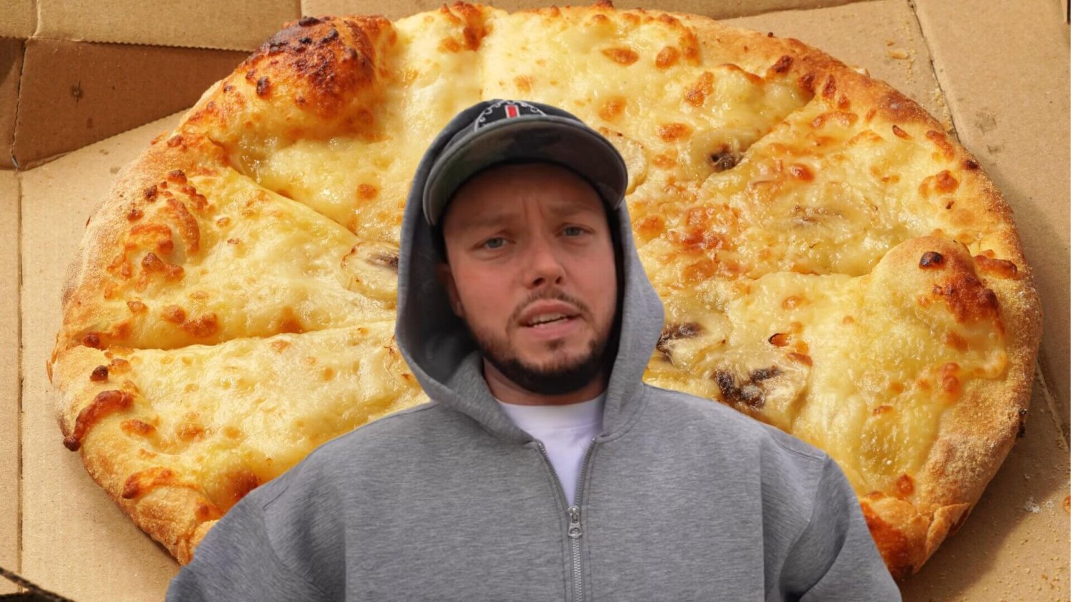 Książulo, w tle pizza