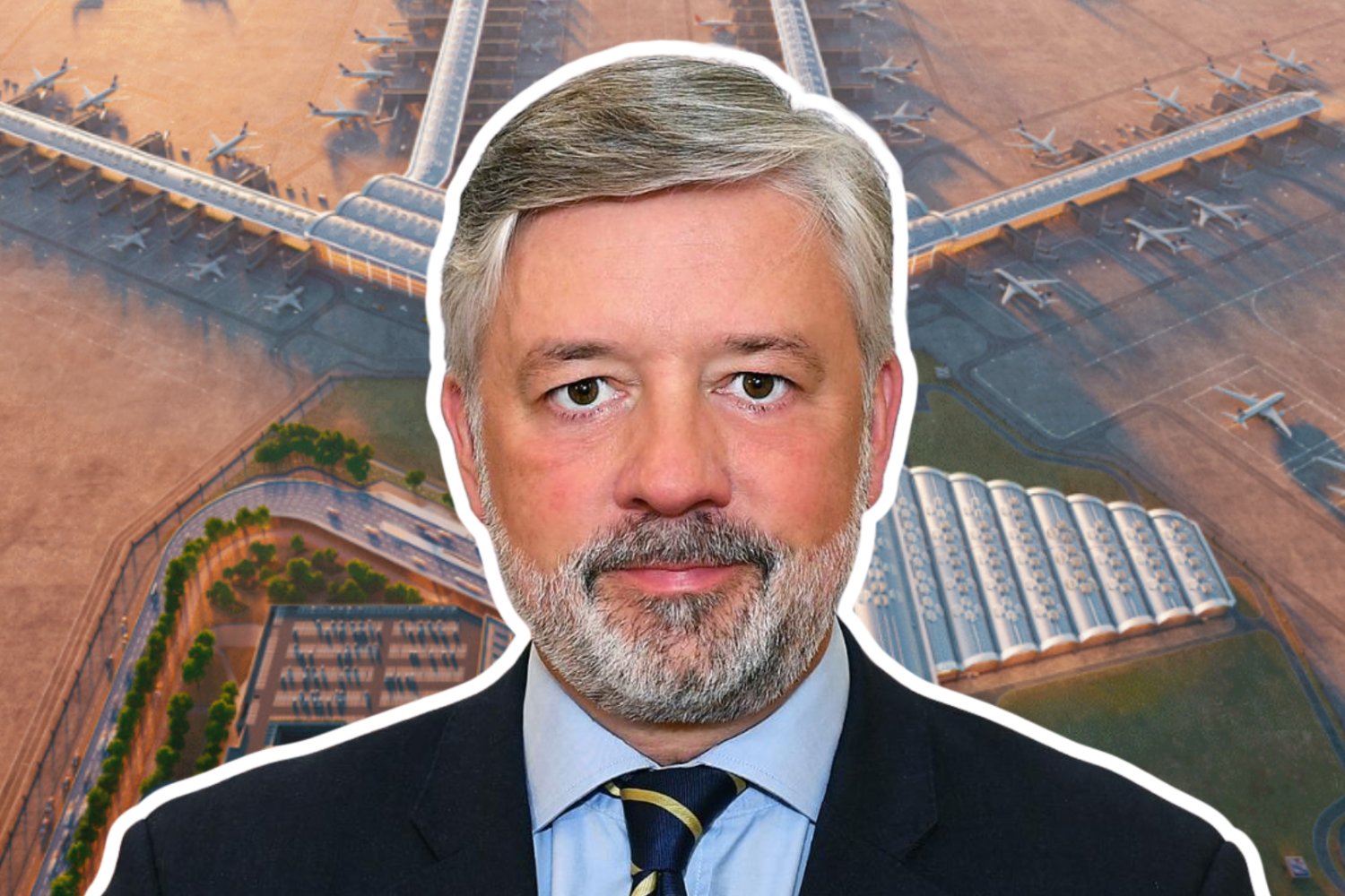 Filip Czernicki, były już prezes CPK. W tle wizualizacja Portu Polska