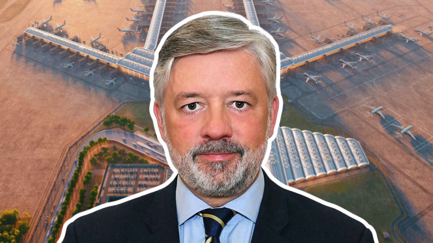 Filip Czernicki, były już prezes CPK. W tle wizualizacja Portu Polska