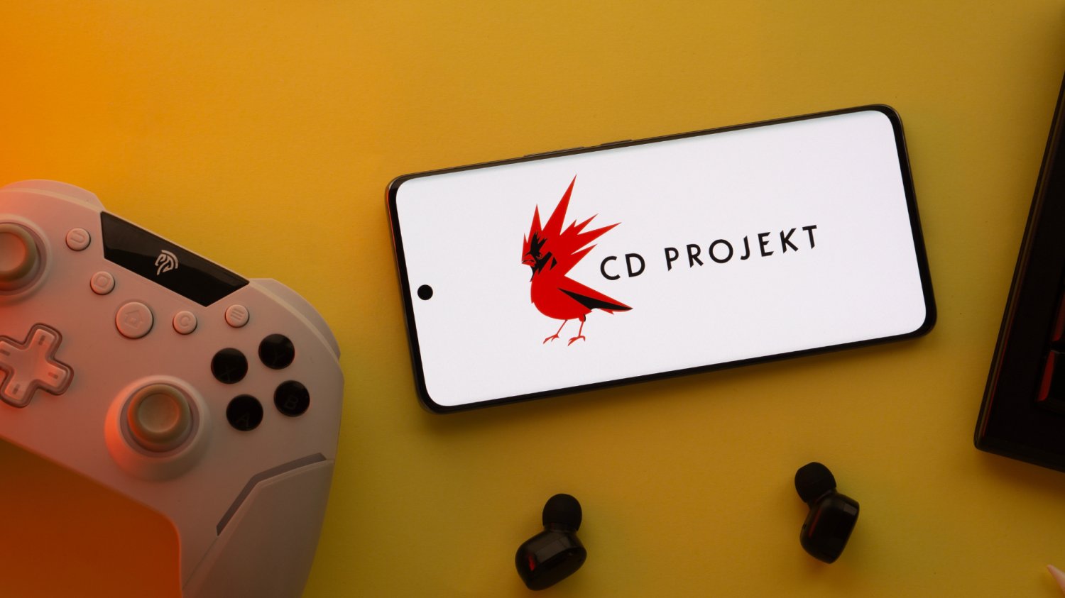 Kurs akcji CD Projekt rośnie po ważnej deklaracji. Chodzi o nowe tytuły firmy Logo CD Projekt na smartfonie