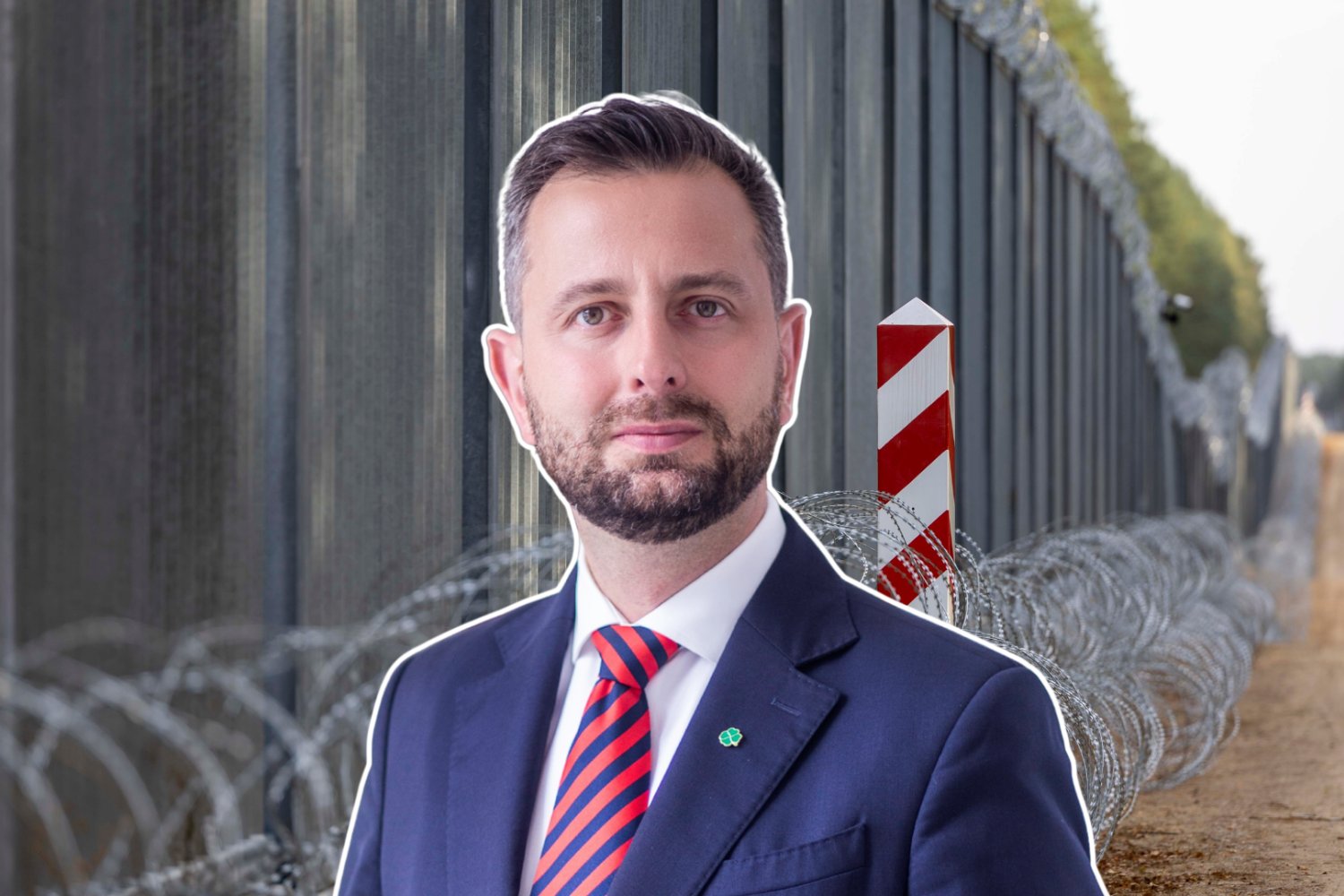 Kosiniak-Kamysz, Minister Obrony Narodowej. W tle zasieki na granicy polskiej