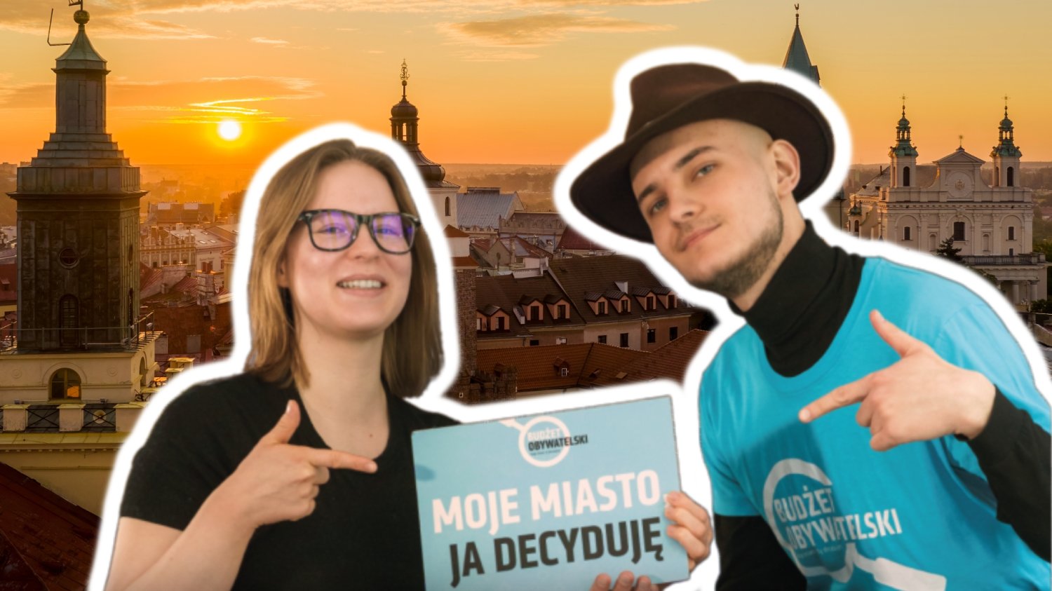 Panorama Lublina. Kobieta i mężczyzna zachęcający do głosowania w BO.